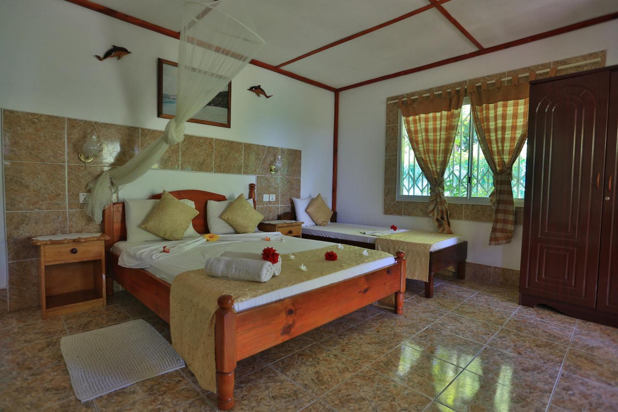 Rising Sun Guesthouse La Digue Bilik gambar